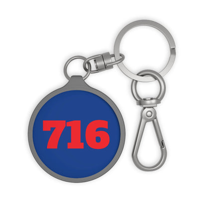 front of 716 blue metal keychain with red text